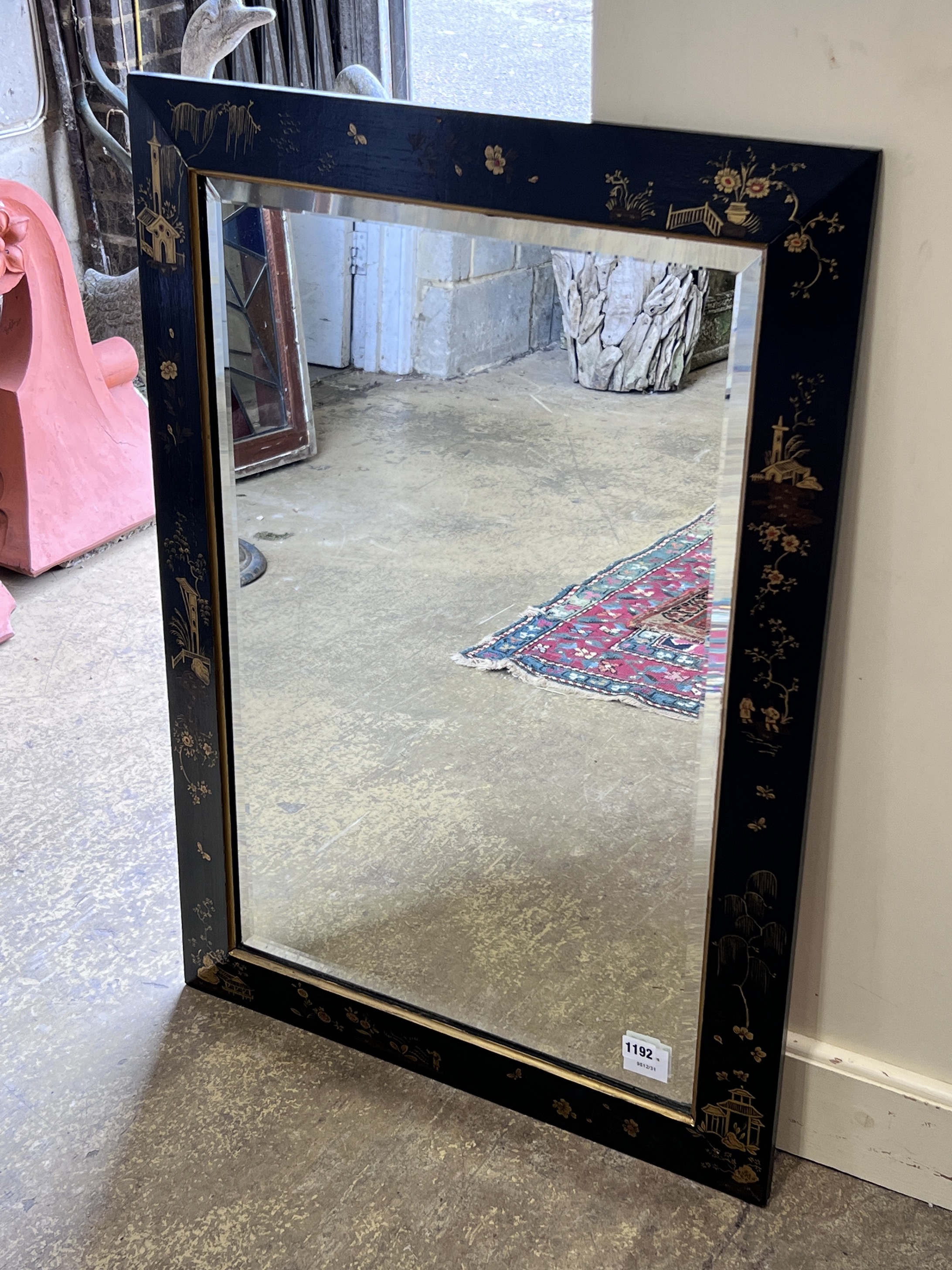 A chinoiserie lacquered wall mirror, width 62cm, height 87cm